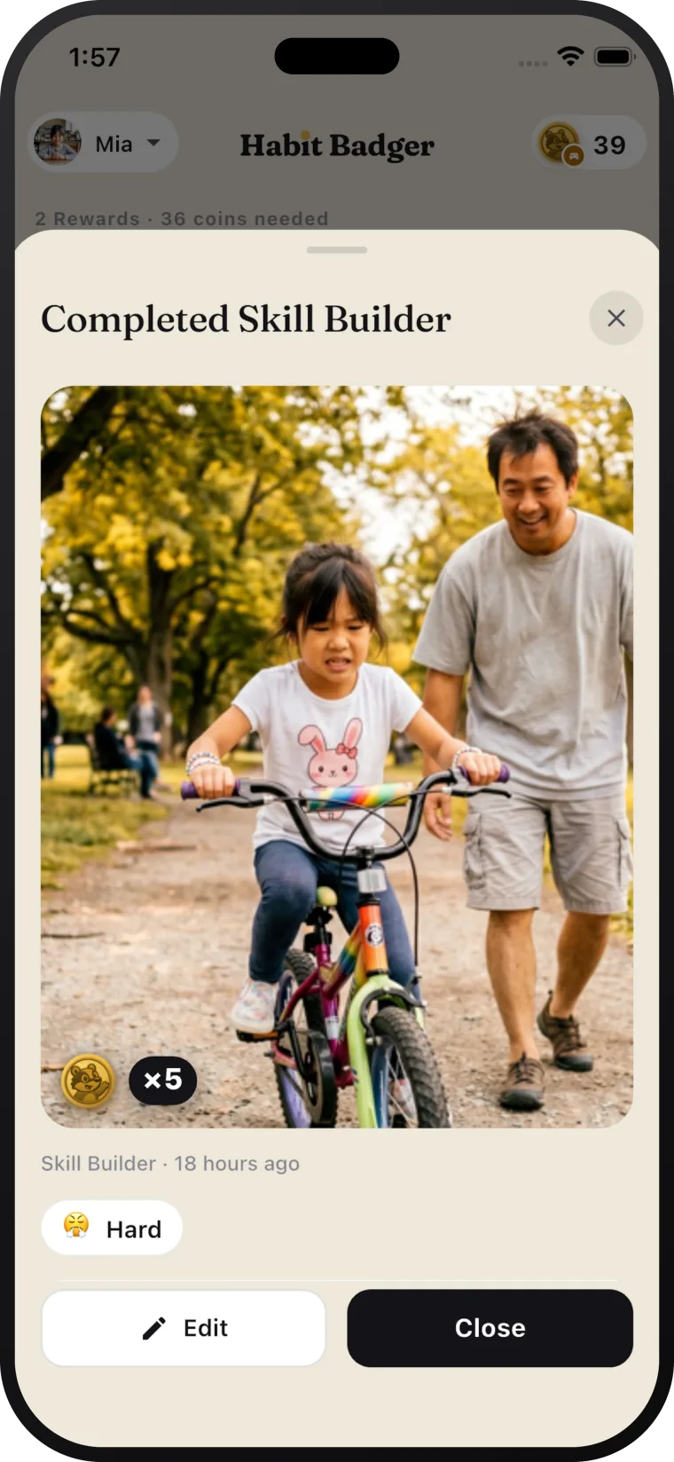 A completed badge moment in Habit Badger — a child learning to ride a bike with their dad, worth five coins